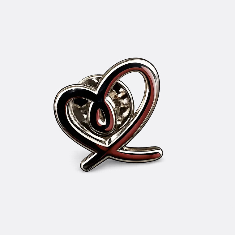 Pin corazón de solidaridad